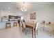 Bright kitchen with granite countertops and dark brown cabinetry at 3842 Whitetail Ct, St Cloud, FL 34772