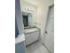 Bathroom with vanity, granite countertop and white cabinets at 4563 Yellowgold E Rd # 108, Kissimmee, FL 34746