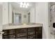 Double vanity bathroom with granite countertop at 4587 Terrasonesta Dr, Davenport, FL 33837