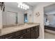 Double vanity bathroom with granite countertop at 4587 Terrasonesta Dr, Davenport, FL 33837