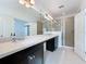 Double vanity bathroom with a large shower at 459 Windmill Palm Cir, Altamonte Springs, FL 32701