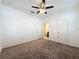 Bedroom with carpet, ceiling fan, and door to bathroom at 459 Windmill Palm Cir, Altamonte Springs, FL 32701