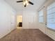 Bright bedroom with carpet, ceiling fan and en-suite bathroom at 459 Windmill Palm Cir, Altamonte Springs, FL 32701