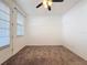 Bright bedroom with neutral carpeting and window blinds at 459 Windmill Palm Cir, Altamonte Springs, FL 32701