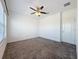 Bright bedroom with ceiling fan and carpet at 459 Windmill Palm Cir, Altamonte Springs, FL 32701