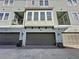 Attached garage with brown overhead door at 459 Windmill Palm Cir, Altamonte Springs, FL 32701