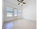 Spacious living room with tile floors and access to a balcony at 459 Windmill Palm Cir, Altamonte Springs, FL 32701