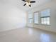 Living room with tile floors and access to balcony at 459 Windmill Palm Cir, Altamonte Springs, FL 32701