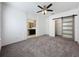 Main bedroom with sliding barn door and ceiling fan at 459 Windmill Palm Cir, Altamonte Springs, FL 32701