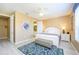 King-size bed, ceiling fan, and access to a walk-in closet at 5012 Shoreway Loop # 30307, Orlando, FL 32819