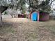 Backyard with shed, playset and wooden fence at 560 Garden Heights Dr, Winter Garden, FL 34787