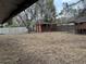 Backyard with shed, playset and wooden fence at 560 Garden Heights Dr, Winter Garden, FL 34787