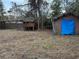 Backyard with shed, playset and wooden fence at 560 Garden Heights Dr, Winter Garden, FL 34787