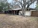 House exterior with screened patio and yard at 560 Garden Heights Dr, Winter Garden, FL 34787