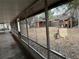 Screened porch overlooking the backyard at 560 Garden Heights Dr, Winter Garden, FL 34787