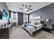 Main bedroom with ceiling fan and gray walls at 568 Seattle Slew Dr, Davenport, FL 33837