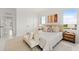 Bright bedroom with a king-size bed and stylish decor at 6230 Chorus Dr, Mascotte, FL 34753