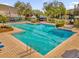 Resort-style pool with a spa and plenty of lounge chairs at 6413 Astor Village Ave # 313, Orlando, FL 32835