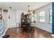 Dining area with round table, chairs, and wood floors at 757 Siena Palm Dr # 757, Celebration, FL 34747