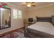 Bright bedroom with a double bed, desk, and mirrored closet at 812 Edgeforest Ter, Sanford, FL 32771