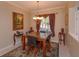 Formal dining room featuring a marble table and chandelier at 812 Edgeforest Ter, Sanford, FL 32771