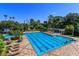 Resort-style pool with lap lanes and plenty of lounge chairs at 812 Edgeforest Ter, Sanford, FL 32771