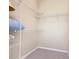 Walk-in closet with wire shelving at 8908 Legacy Ct # 201, Kissimmee, FL 34747