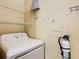 Laundry room includes washer, dryer, and extra storage at 8908 Legacy Ct # 201, Kissimmee, FL 34747