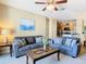 Living room with gray couches and coffee table at 8908 Legacy Ct # 201, Kissimmee, FL 34747