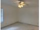 Bedroom with ceiling fan and light floors at 9142 Sabal Palm Cir, Windermere, FL 34786