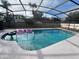 Relaxing screened-in pool with patio at 9142 Sabal Palm Cir, Windermere, FL 34786