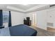 Bright bedroom with a large bed and built-in dresser at 11836 Language Way, Orlando, FL 32832