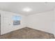 Well-lit bedroom featuring a window and wall-to-wall carpet at 11836 Language Way, Orlando, FL 32832