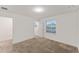 Spacious bedroom with neutral walls and carpet at 11836 Language Way, Orlando, FL 32832