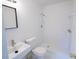 Clean, bright bathroom with modern sink, toilet, and tiled shower, offering a fresh and functional space at 100 El Camino Dr # 102, Winter Haven, FL 33884