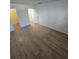 Bright bedroom with wood flooring and closet at 100 El Camino Dr # 102, Winter Haven, FL 33884