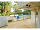 Pool deck, a sign indicates a private pool and clubhouse for residents at 100 El Camino Dr # 102, Winter Haven, FL 33884