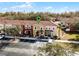 Aerial view of townhomes with well-maintained landscaping and convenient parking at 1068 Park Ridge Cir, Kissimmee, FL 34746