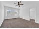 Spacious bedroom featuring a walk-in closet and ceiling fan at 1076 Taramundi Dr, Oviedo, FL 32765