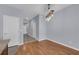 Bright dining area with hardwood floors and modern chandelier at 1076 Taramundi Dr, Oviedo, FL 32765