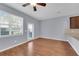 Living area with hardwood floors and ceiling fan at 1076 Taramundi Dr, Oviedo, FL 32765