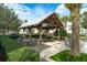 Relaxing poolside patio with pergola at 1076 Taramundi Dr, Oviedo, FL 32765