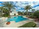 Community pool with lounge chairs at 1076 Taramundi Dr, Oviedo, FL 32765