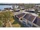 Aerial view of townhouses near lake, showcasing waterfront location at 109 Madrid Dr # 109, Casselberry, FL 32707