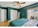 Bedroom with a bed, built-in closet, and access to a private patio at 109 Madrid Dr # 109, Casselberry, FL 32707