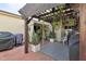 Covered patio with pergola, seating area, and lush greenery at 109 Madrid Dr # 109, Casselberry, FL 32707