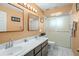 Bathroom with double sinks and shower at 1107 Seafarer Ln, Winter Springs, FL 32708