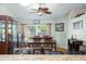 View of dining room from kitchen, hardwood floors and large window at 1107 Seafarer Ln, Winter Springs, FL 32708