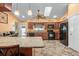 Bright kitchen with granite countertops and modern appliances at 1107 Seafarer Ln, Winter Springs, FL 32708