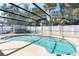 Inviting kidney-shaped pool with a screened enclosure at 1107 Seafarer Ln, Winter Springs, FL 32708